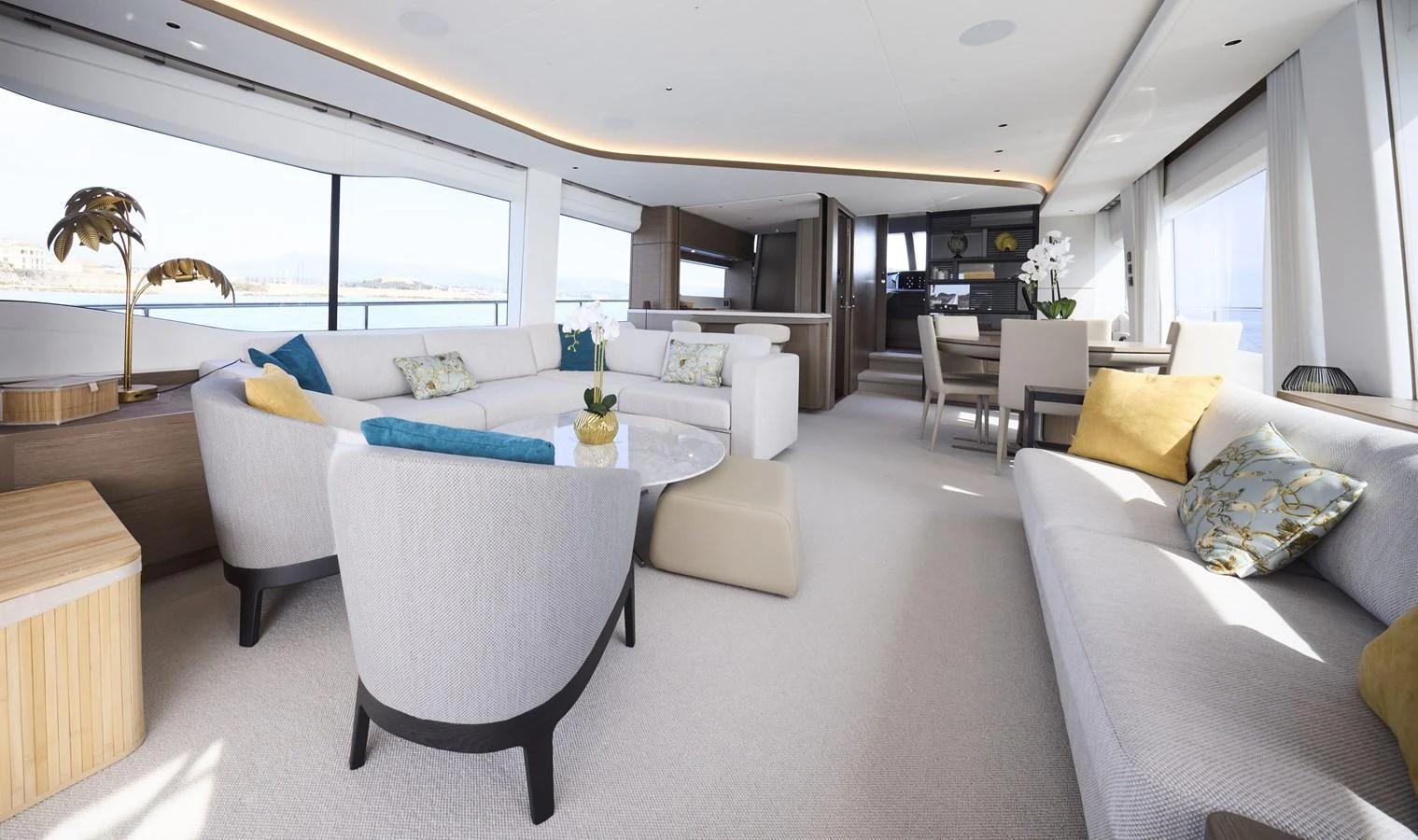 The yacht's salon features a spacious and elegantly designed seating area with panoramic windows. aboard POLARIS Yacht for Sale