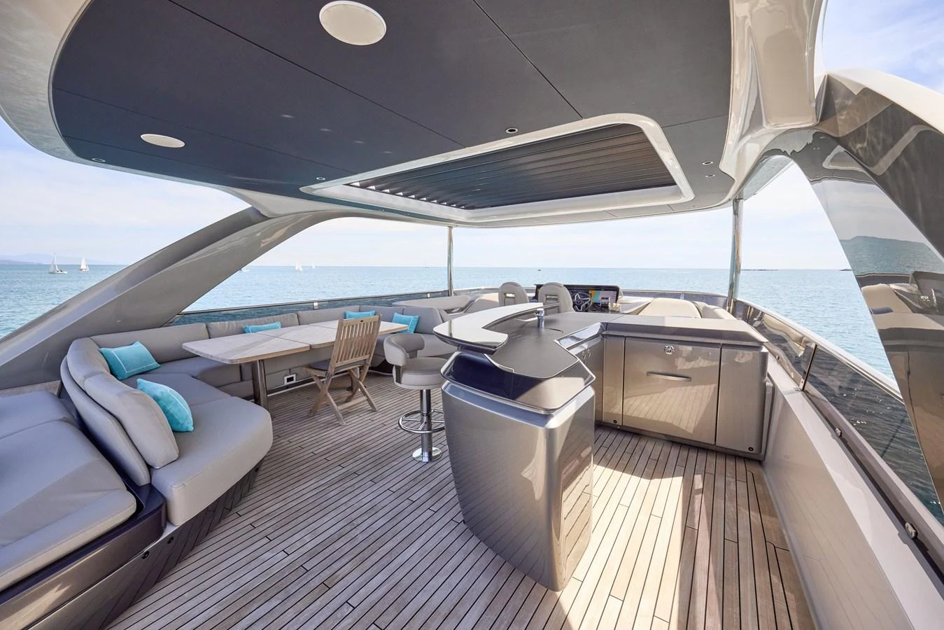 The flybridge offers a spacious and luxurious outdoor area with comfortable seating and a well-equipped bar. aboard POLARIS Yacht for Sale