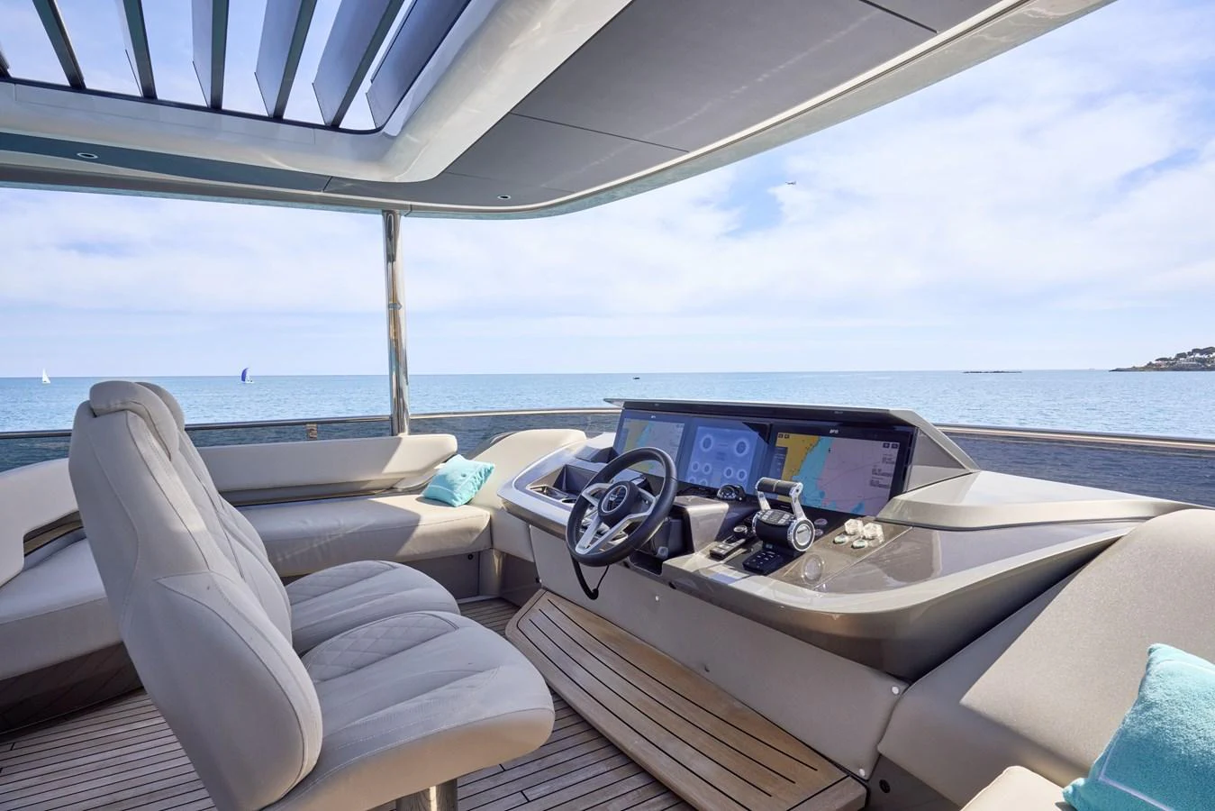 The helm station offers a sleek and modern design with panoramic sea views. aboard POLARIS Yacht for Sale