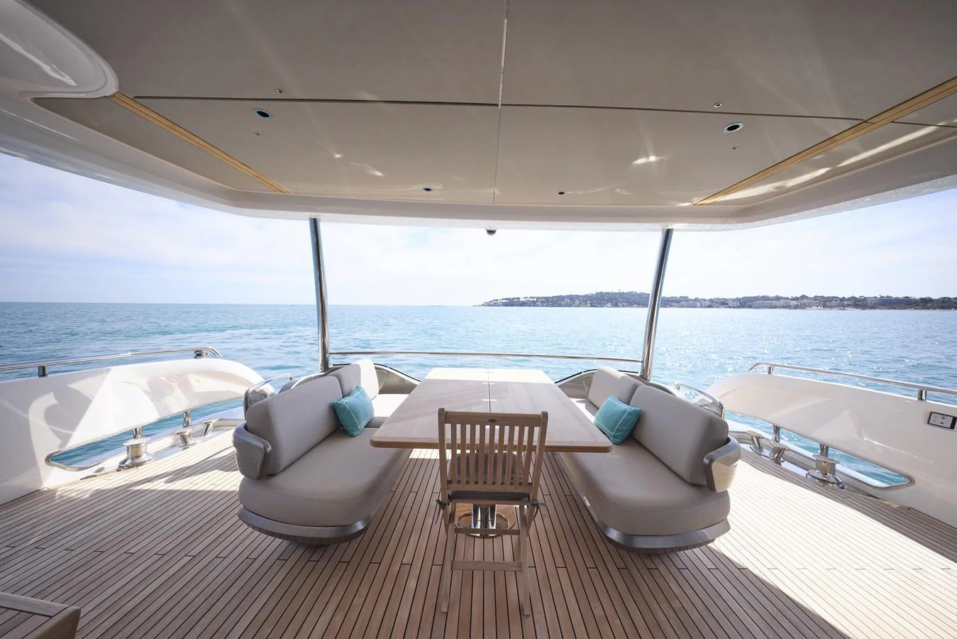 The aft deck offers a spacious and inviting area with comfortable seating and a stunning view of the sea. aboard POLARIS Yacht for Sale
