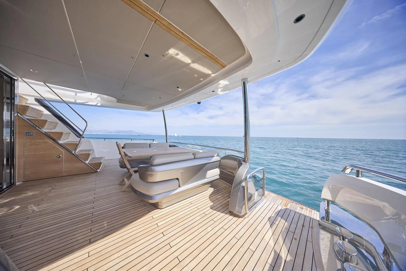 The aft deck offers a spacious and elegant area for relaxation with stunning ocean views. aboard POLARIS Yacht for Sale