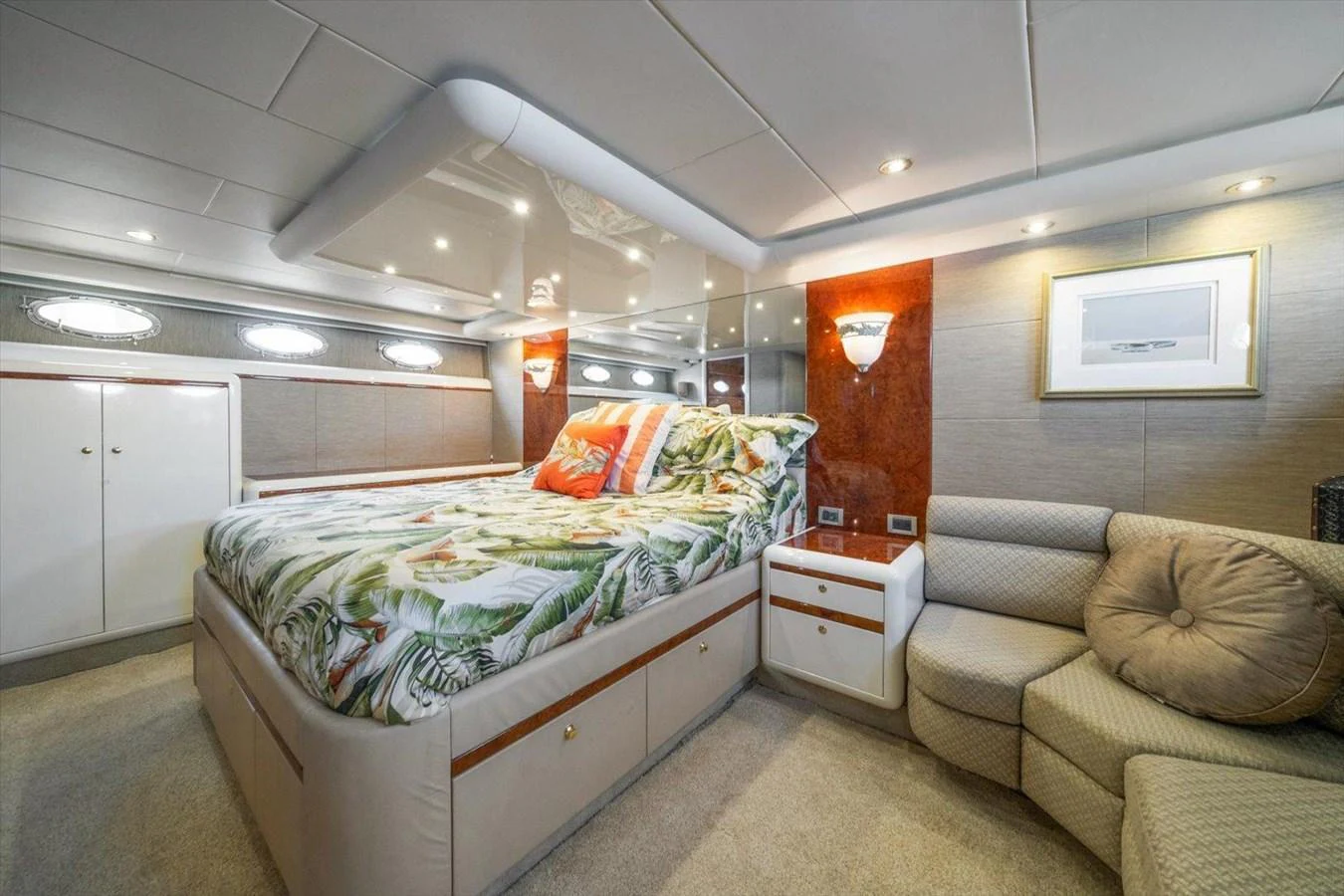 The stateroom offers a cozy and inviting atmosphere with a large bed and comfortable seating area. aboard OCTOPI Yacht for Sale
