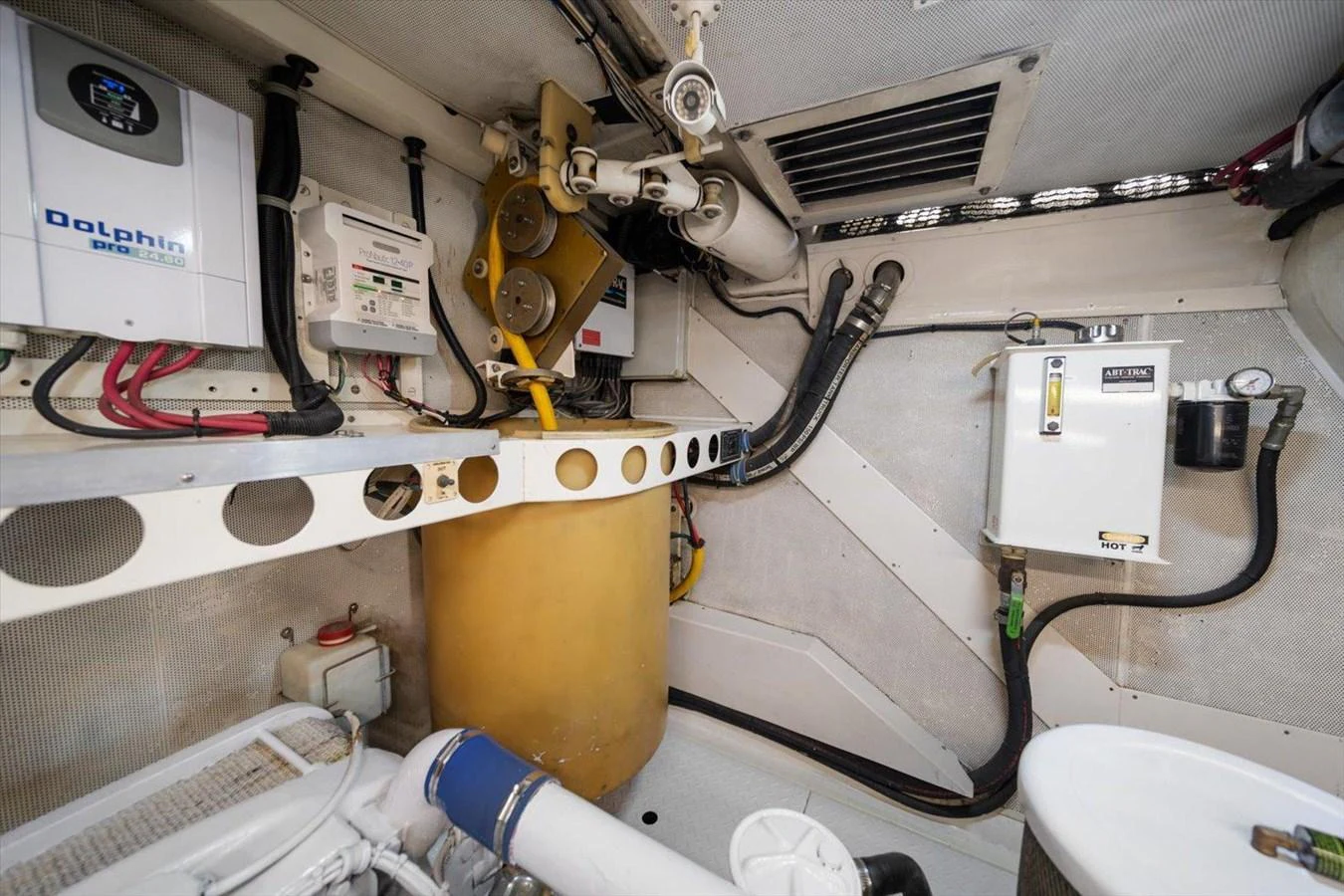 The image showcases the well-organized engine room of the yacht, featuring various technical components and equipment. aboard OCTOPI Yacht for Sale