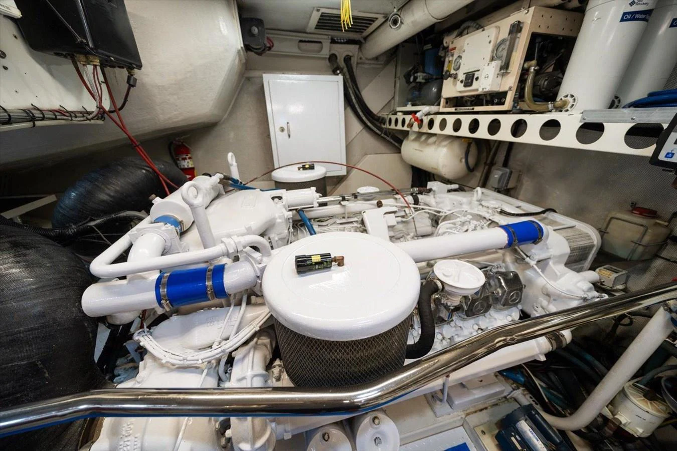 The image showcases the meticulously maintained engine room of the yacht. aboard OCTOPI Yacht for Sale