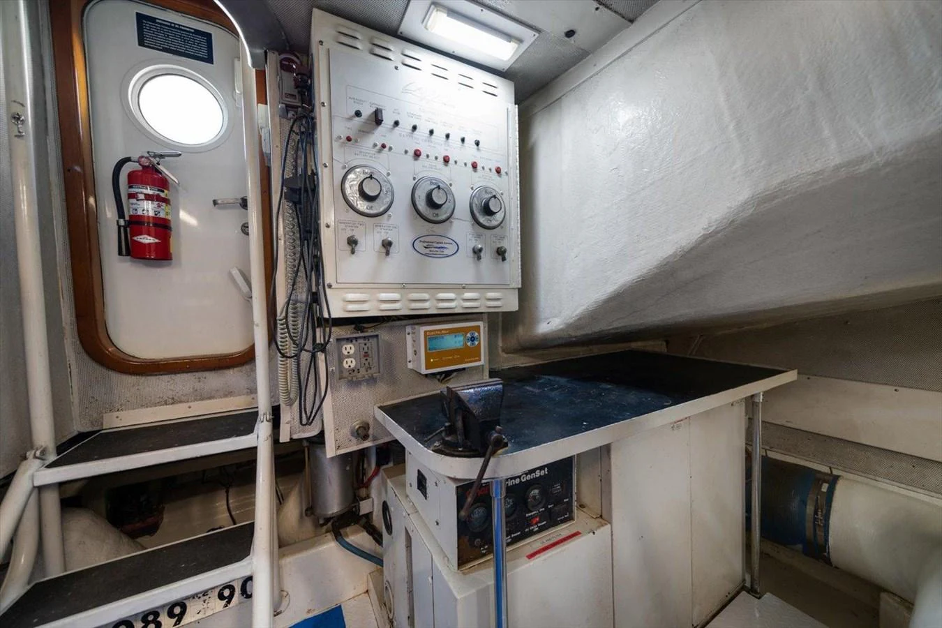 The image showcases a technical area of the yacht, featuring control panels and equipment. aboard OCTOPI Yacht for Sale