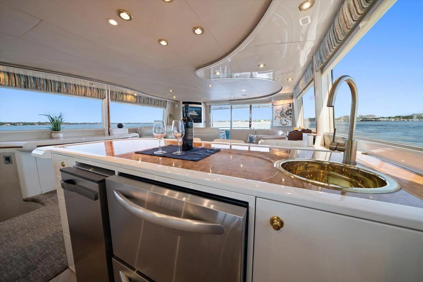 The yacht's galley features modern appliances and a stunning view through large windows. aboard OCTOPI Yacht for Sale