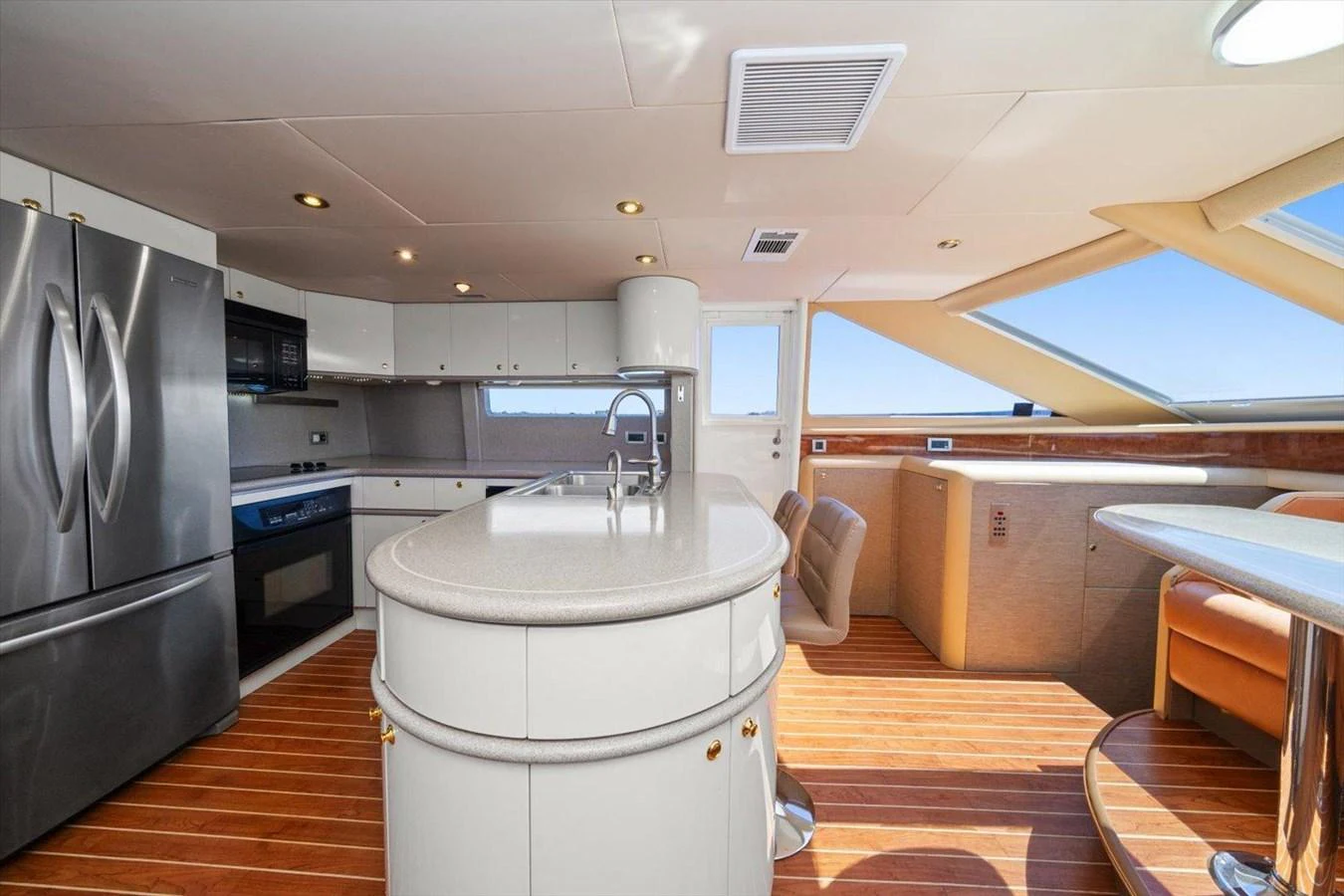 The yacht's galley features modern appliances and a sleek design with ample natural light. aboard OCTOPI Yacht for Sale