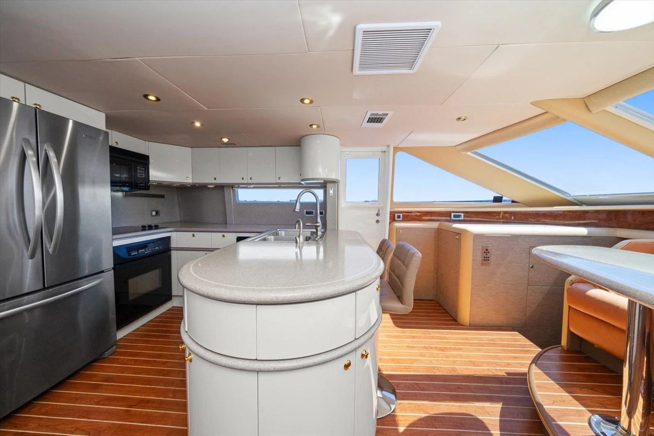 The galley features modern appliances and a sleek design with ample natural light. aboard OCTOPI Yacht for Sale