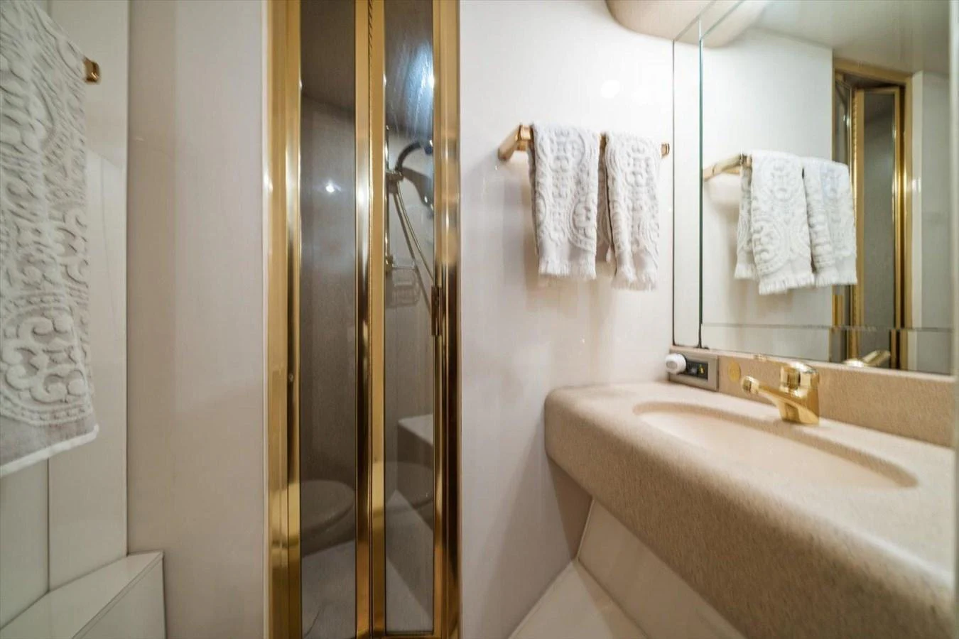 The yacht's bathroom features elegant fixtures and a clean, sophisticated design. aboard OCTOPI Yacht for Sale