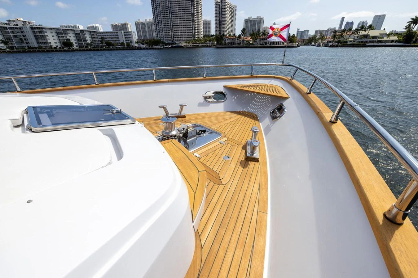 The foredeck offers a spacious and inviting area with beautiful wood accents and modern fittings. aboard SEA METRI V Yacht for Sale