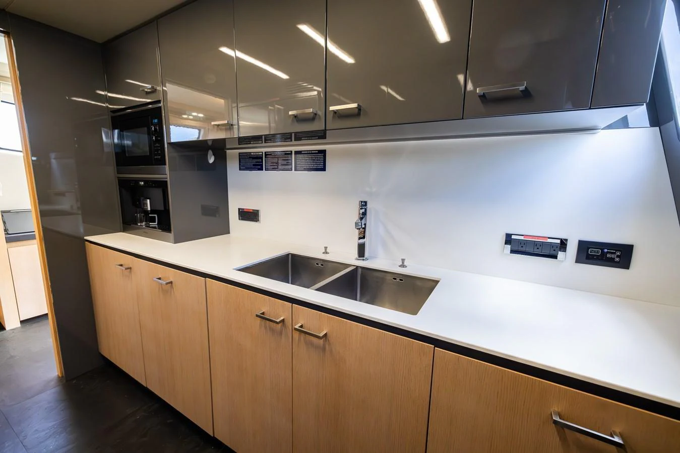 The yacht's galley features modern cabinetry and sleek appliances. aboard SEA METRI V Yacht for Sale