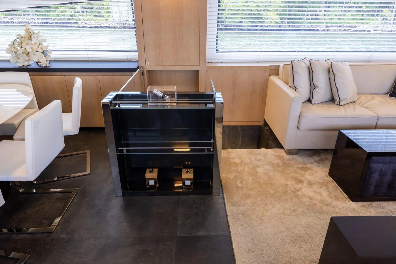 The yacht's interior features a stylish and comfortable seating area with modern furnishings. aboard SEA METRI V Yacht for Sale