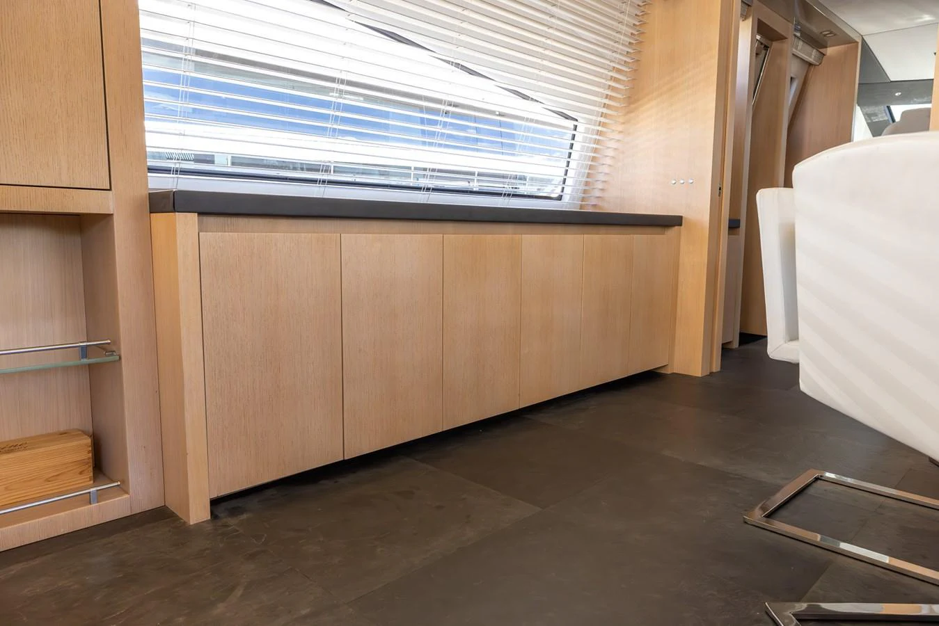 The interior features sleek wooden cabinetry and modern furnishings. aboard SEA METRI V Yacht for Sale