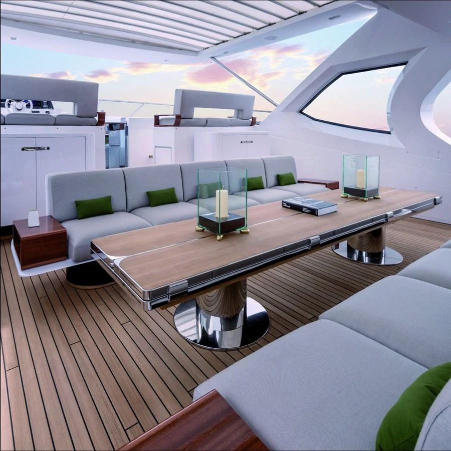 a room with a table and chairs aboard SHABBY OF THE SEAS Yacht for Sale