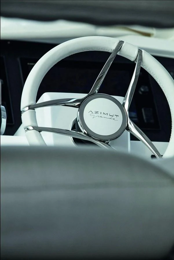 a close-up of a car's steering wheel aboard SHABBY OF THE SEAS Yacht for Sale