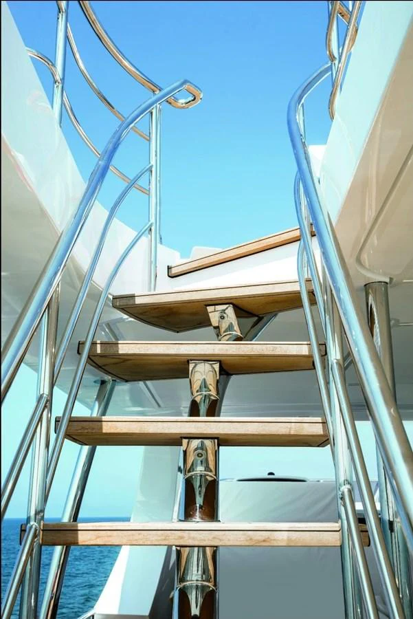 a person climbing a ladder aboard SHABBY OF THE SEAS Yacht for Sale