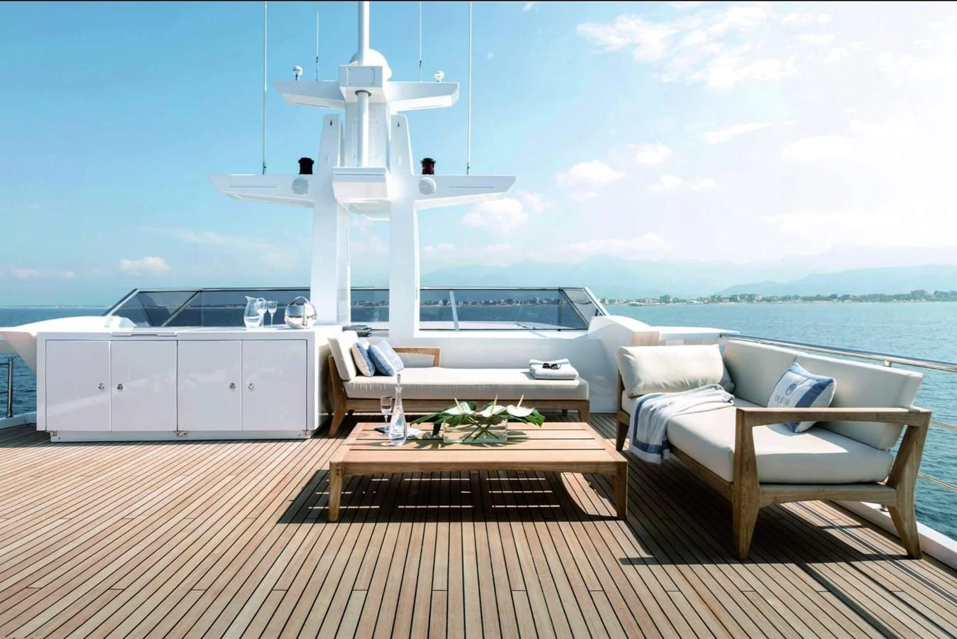 a white room with a white table and a white chair and a white building with a white fan aboard SHABBY OF THE SEAS Yacht for Sale