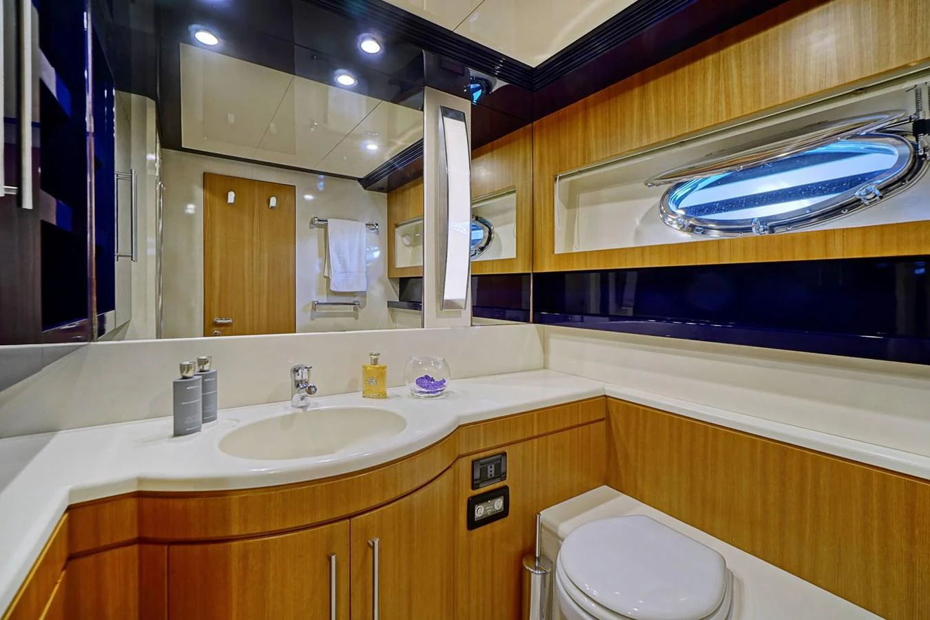 The yacht's bathroom features modern fixtures and a sleek design. aboard RIVA 72' Yacht for Sale