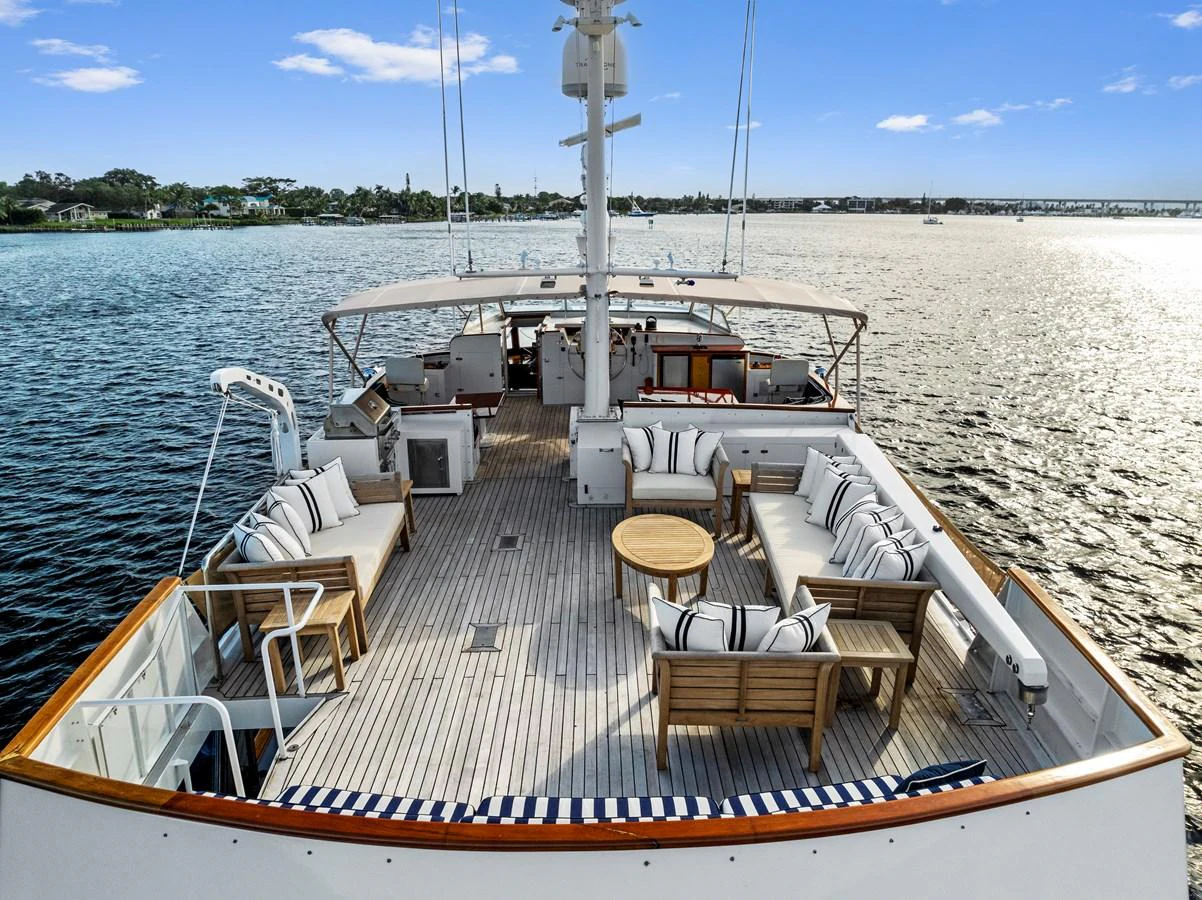 The spacious aft deck offers ample seating and stunning views over the water. aboard CHANTICLEER Yacht for Sale