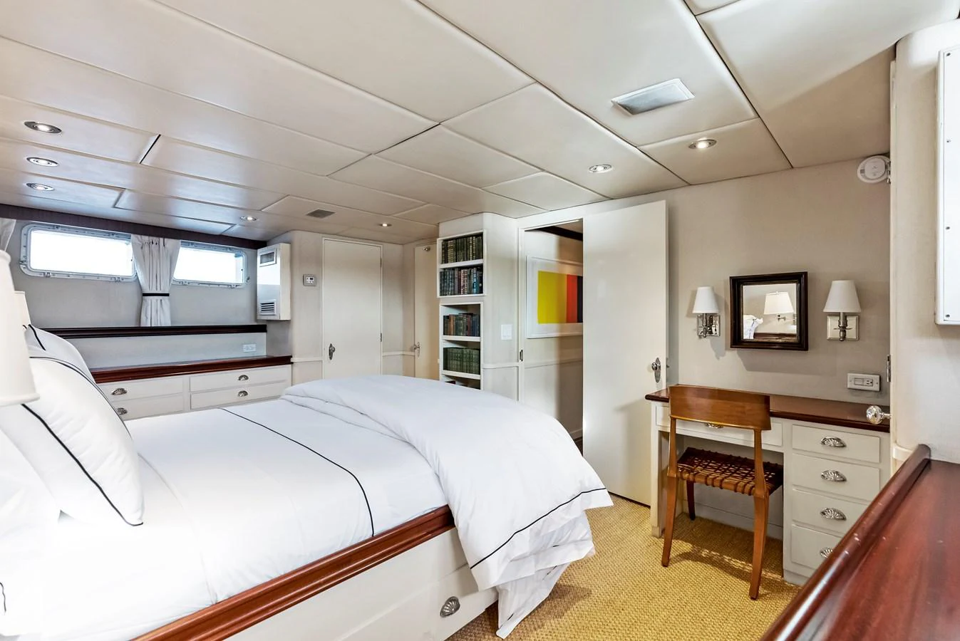 The stateroom features a comfortable bed, ample storage, and elegant decor. aboard CHANTICLEER Yacht for Sale