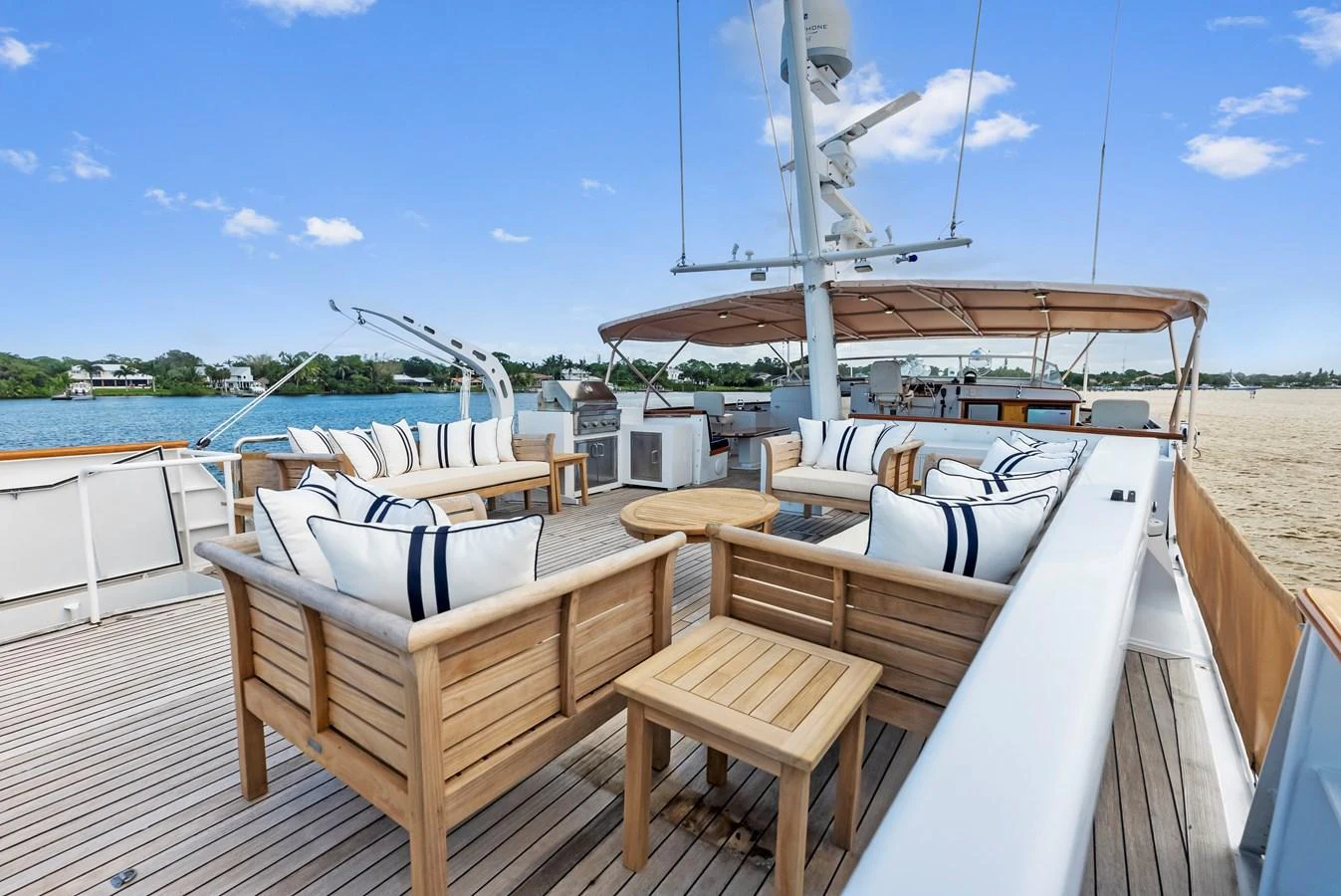 The sundeck offers a spacious and inviting area with comfortable seating and scenic views. aboard CHANTICLEER Yacht for Sale