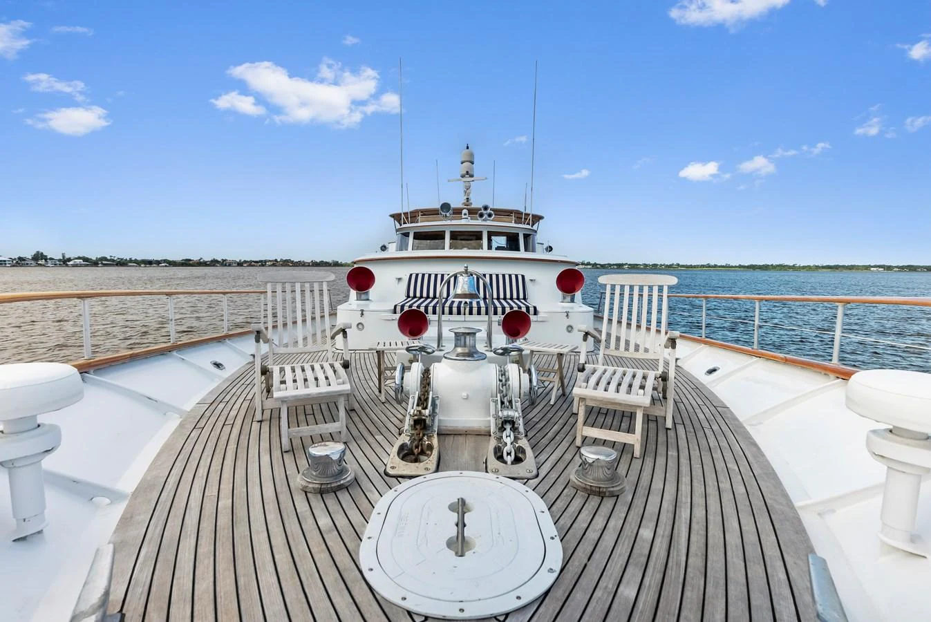 The foredeck offers a spacious and inviting area with seating and a beautiful view of the water. aboard CHANTICLEER Yacht for Sale