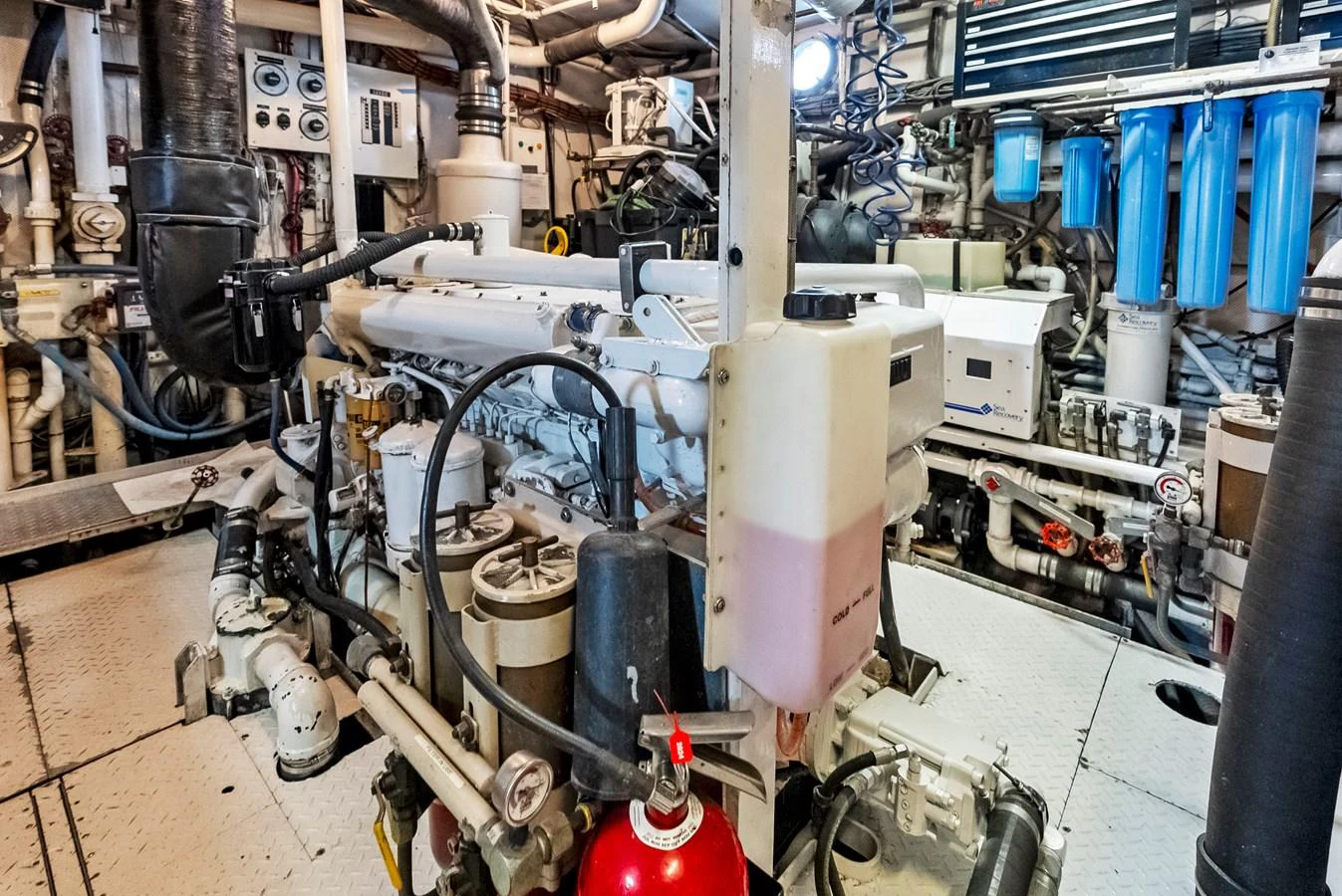 The image showcases the well-maintained engine room of the yacht, featuring advanced machinery and equipment. aboard CHANTICLEER Yacht for Sale
