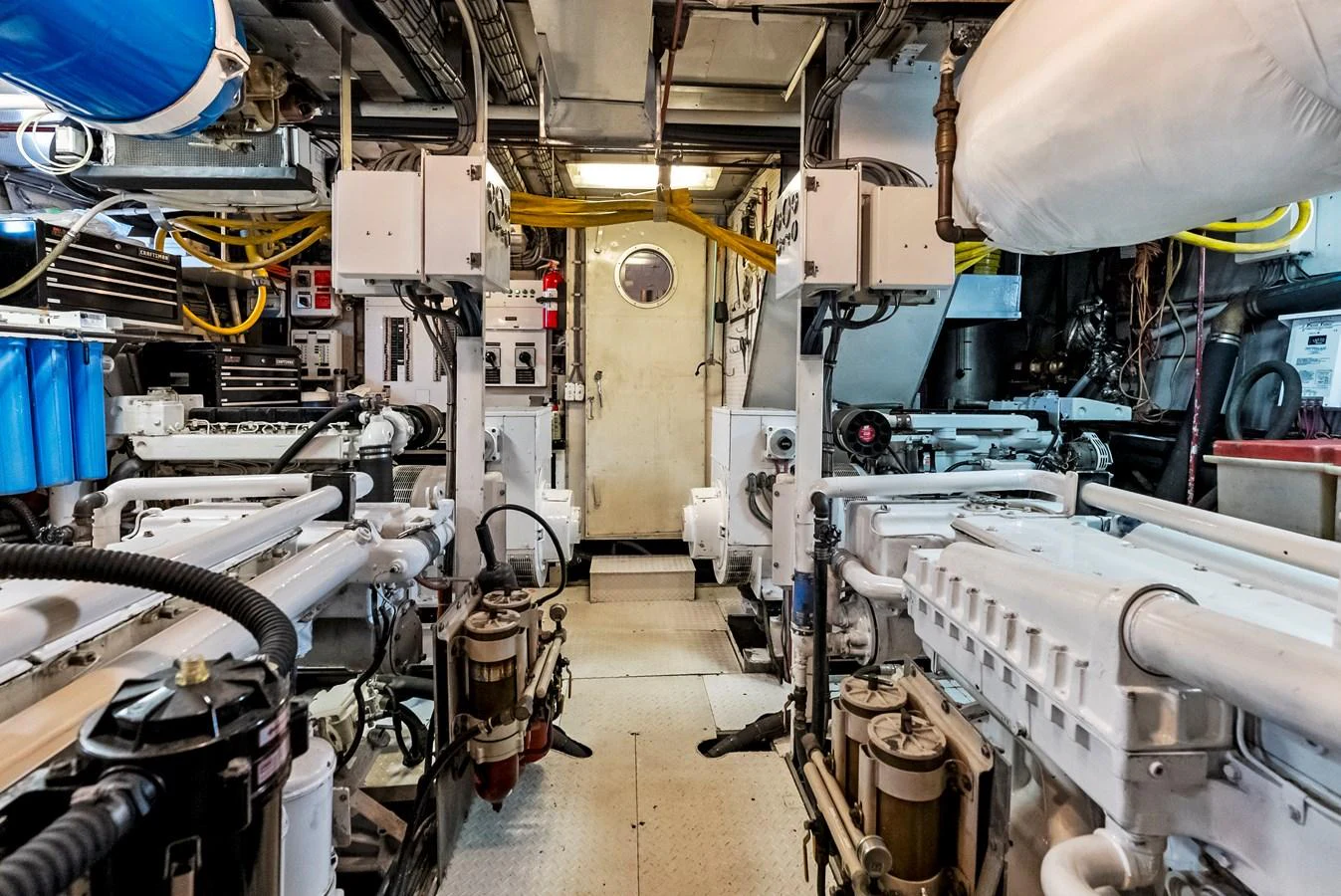 The image showcases the well-maintained engine room of the yacht, highlighting its advanced machinery and organized layout. aboard CHANTICLEER Yacht for Sale