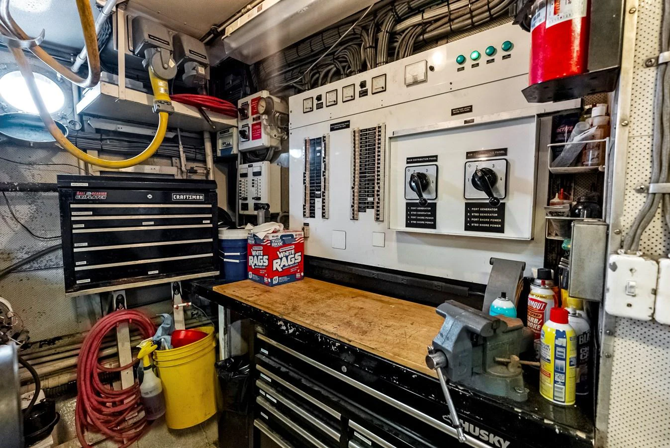 The engine room is equipped with essential tools and control panels for efficient yacht maintenance. aboard CHANTICLEER Yacht for Sale