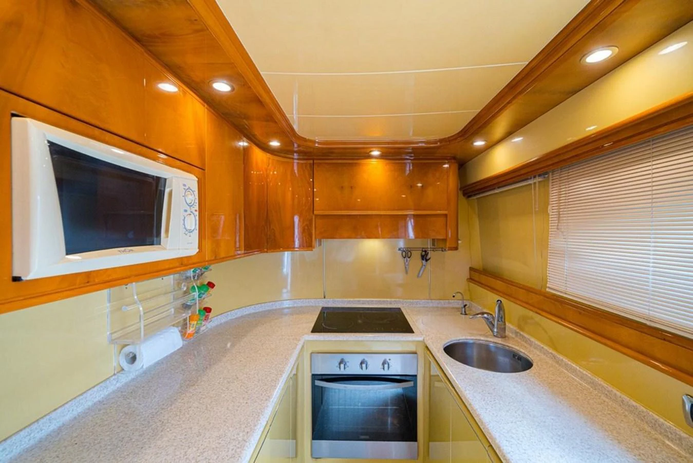 The yacht's galley features modern appliances and ample counter space, ideal for gourmet cooking at sea. aboard ASTONDOA 82 GLX Yacht for Sale