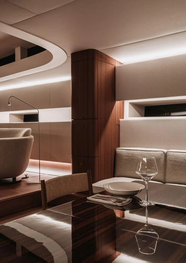 The yacht's interior features a sophisticated and modern design with elegant lighting and luxurious furnishings. aboard 2026 YYACHTS Y8 Yacht for Sale