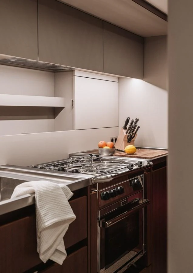 The yacht's galley features modern appliances and a sleek design, perfect for gourmet cooking at sea. aboard 2026 YYACHTS Y8 Yacht for Sale