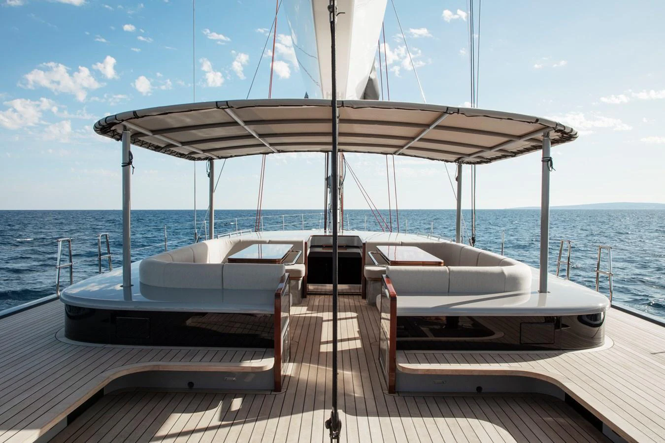 The aft deck features spacious seating areas under a sleek canopy, perfect for relaxation while cruising. aboard 2026 YYACHTS Y8 Yacht for Sale