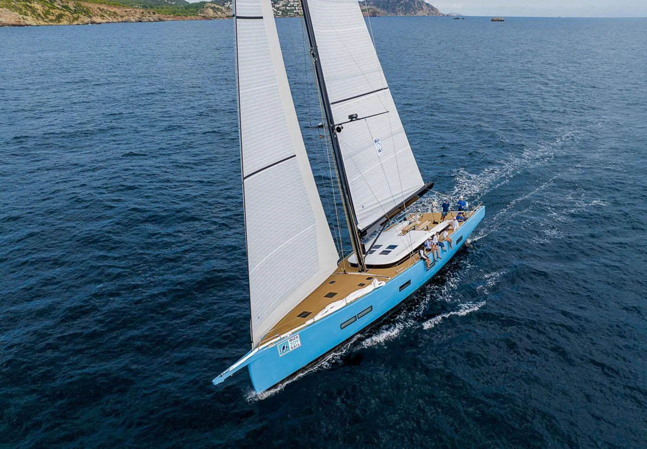 A sleek sailing yacht glides gracefully on the open sea, showcasing its modern design and expansive deck. aboard 2026 YYACHTS Y7 Yacht for Sale