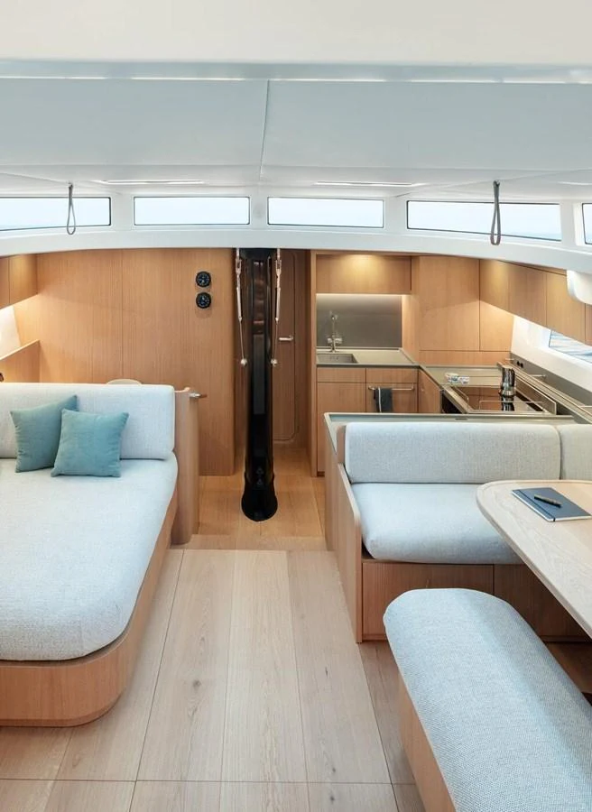 The yacht's salon features a modern and inviting design with ample natural light. aboard 2026 YYACHTS Y7 Yacht for Sale