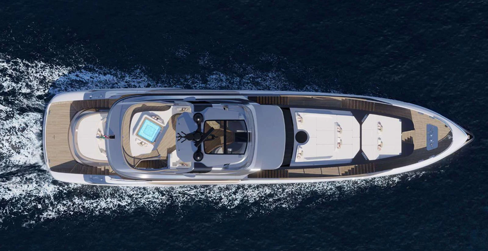 An aerial view of a sleek yacht cruising through the water, showcasing its elegant design and spacious deck areas. aboard T-EVO 120 Yacht for Sale