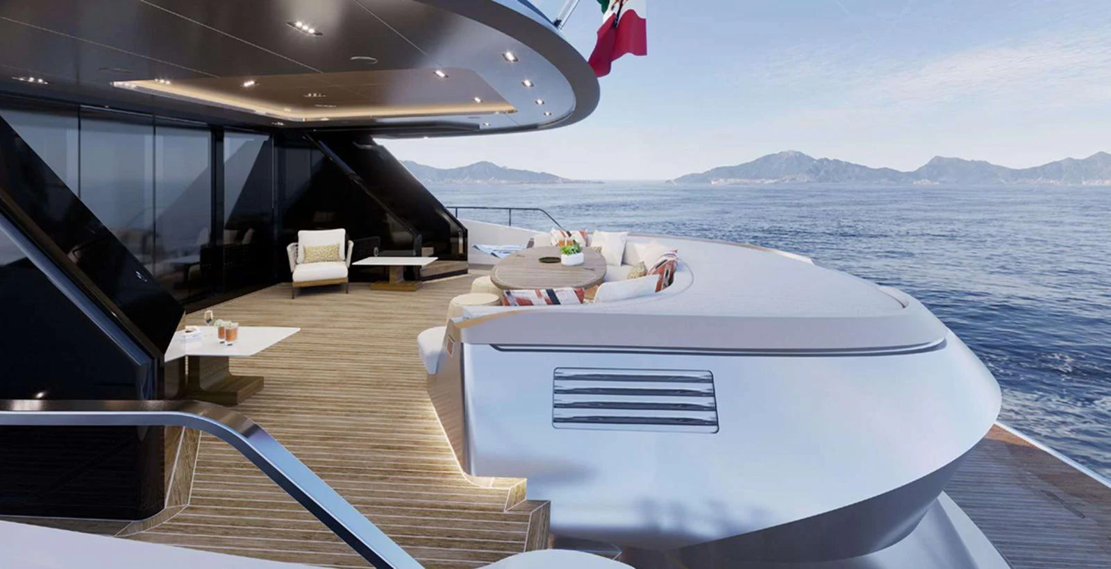 The aft deck offers a luxurious outdoor seating area with stunning views of the sea. aboard T-EVO 120 Yacht for Sale