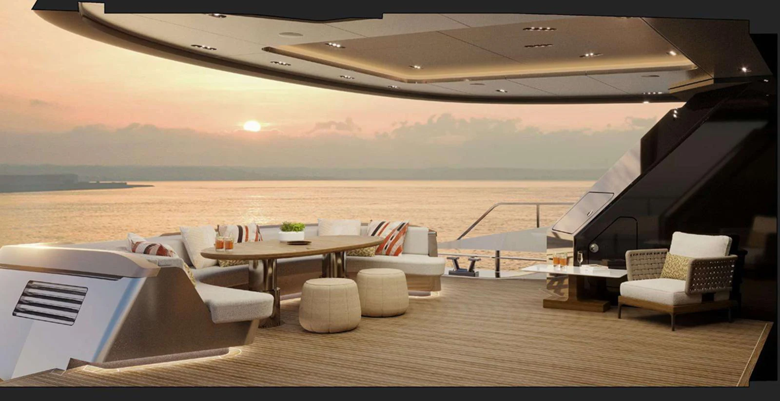 The aft deck offers a luxurious outdoor seating area with stunning sunset views over the water. aboard T-EVO 120 Yacht for Sale