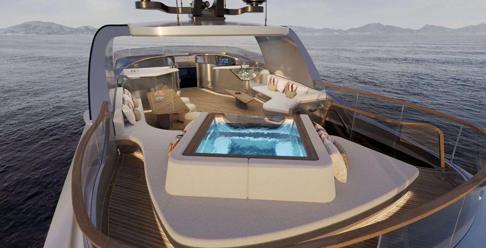 The sundeck features a luxurious hot tub surrounded by comfortable seating with panoramic ocean views. aboard T-EVO 120 Yacht for Sale