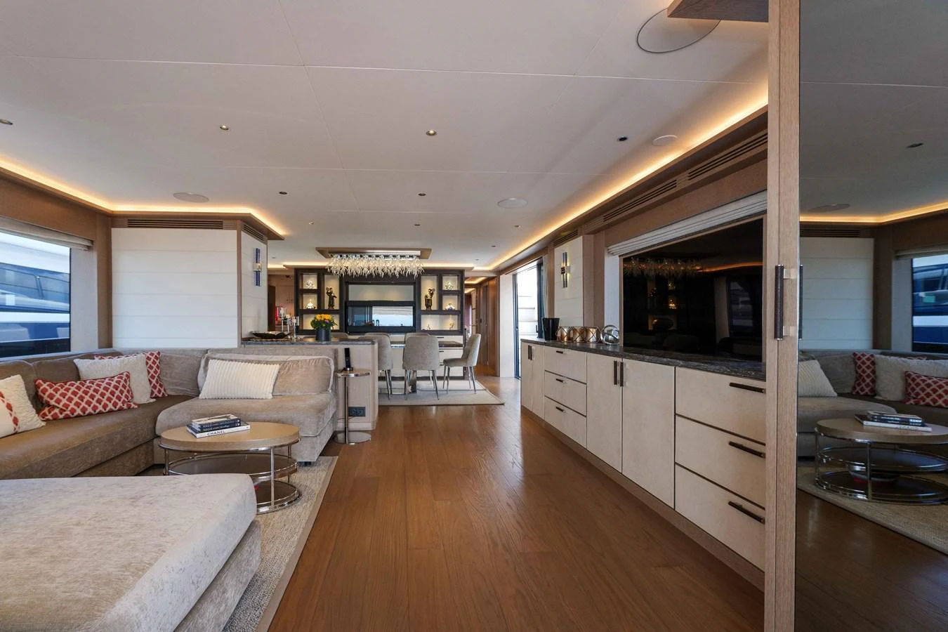 The spacious salon features elegant furnishings and ample natural light. aboard 2024 SIRENA 88 Yacht for Sale