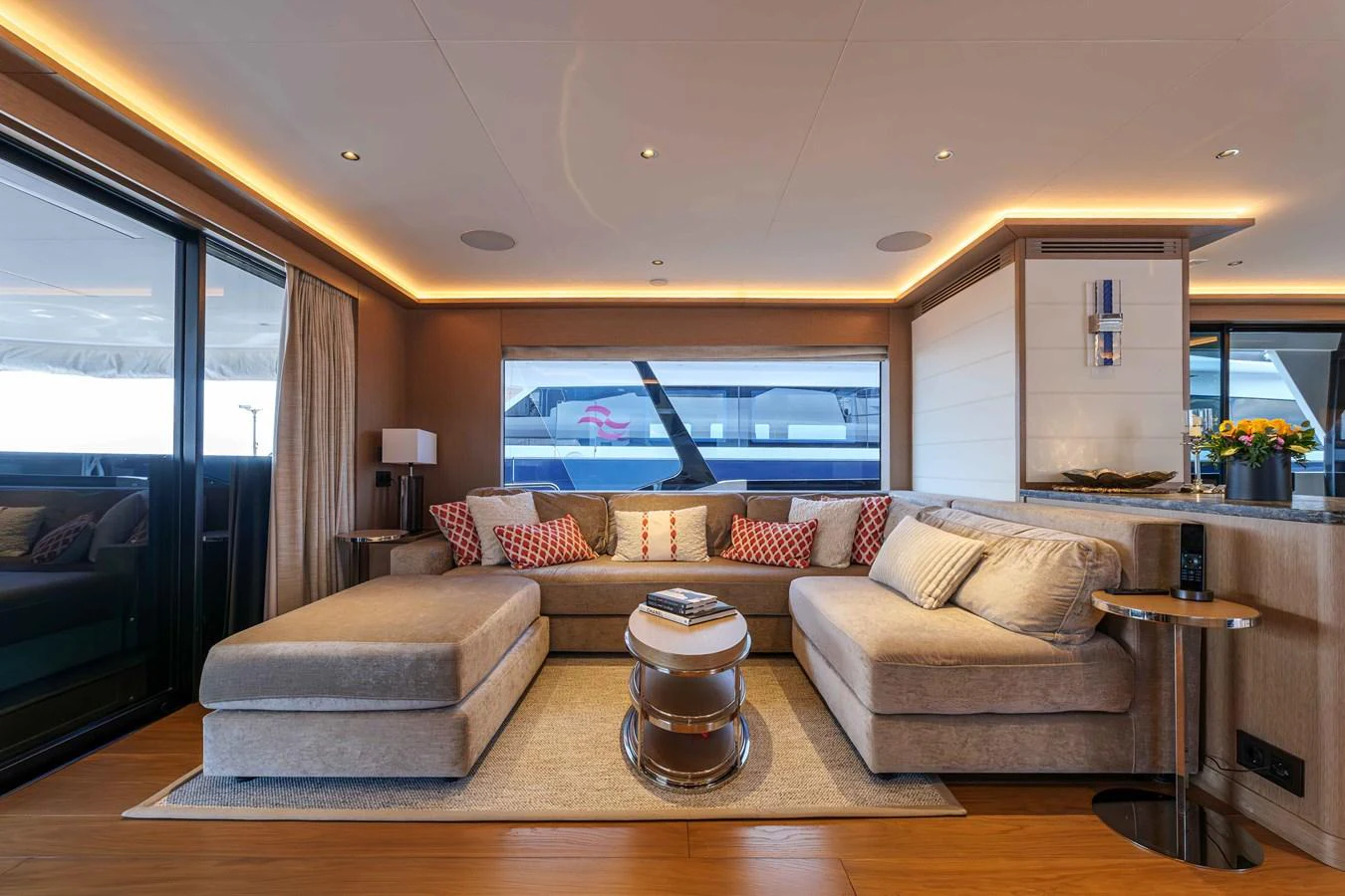 The salon features a spacious and luxurious seating area with modern decor and ample natural light. aboard 2024 SIRENA 88 Yacht for Sale