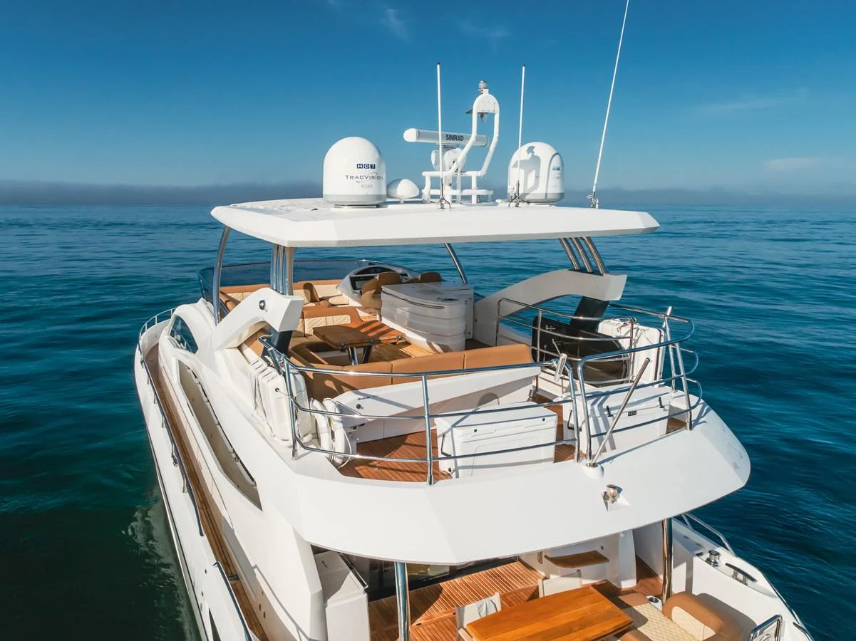 The yacht's flybridge offers a spacious and luxurious area for relaxation and entertainment with stunning ocean views. aboard AGUA RANCHO Yacht for Sale