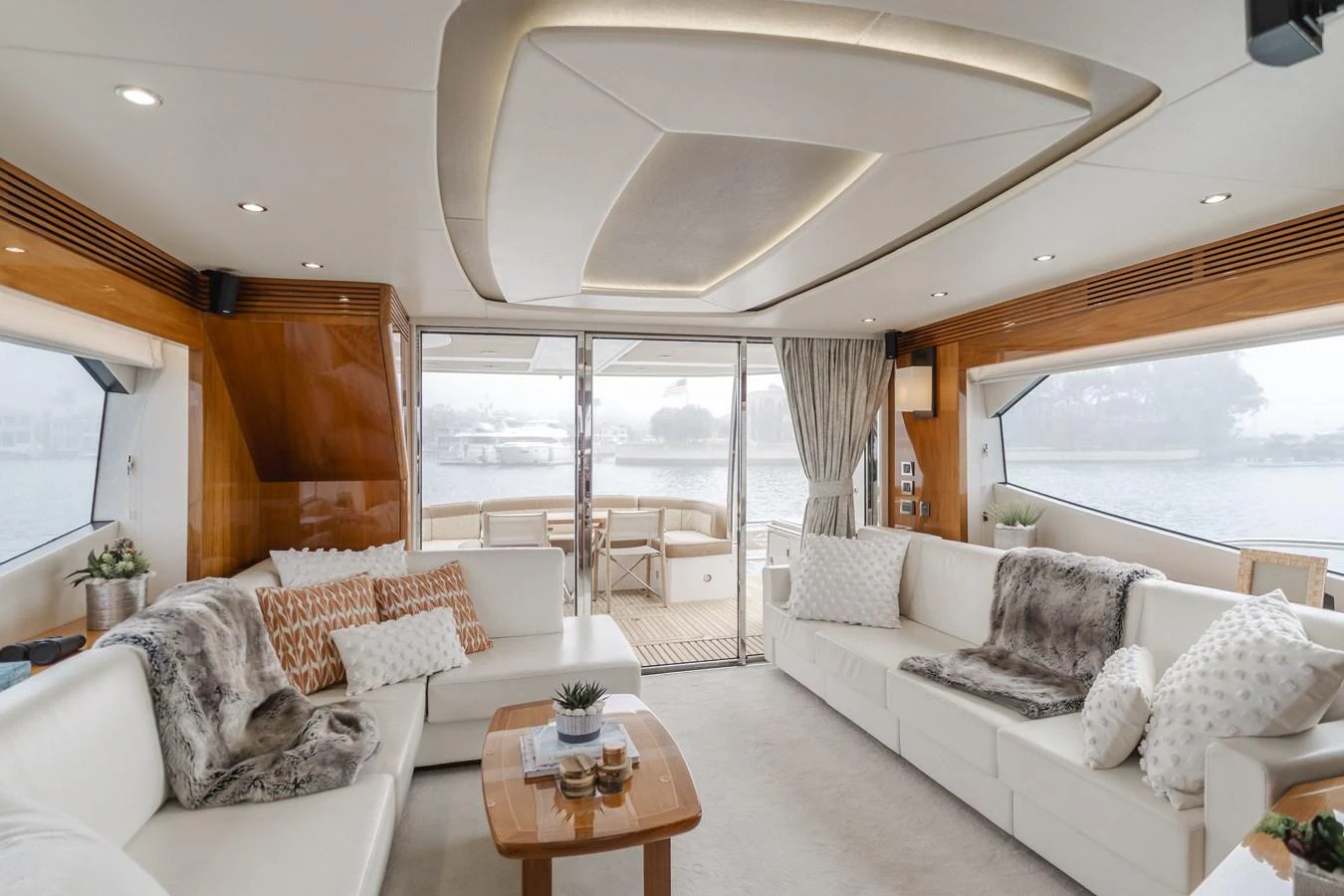 The salon offers a luxurious and comfortable space with ample seating and elegant decor. aboard AGUA RANCHO Yacht for Sale