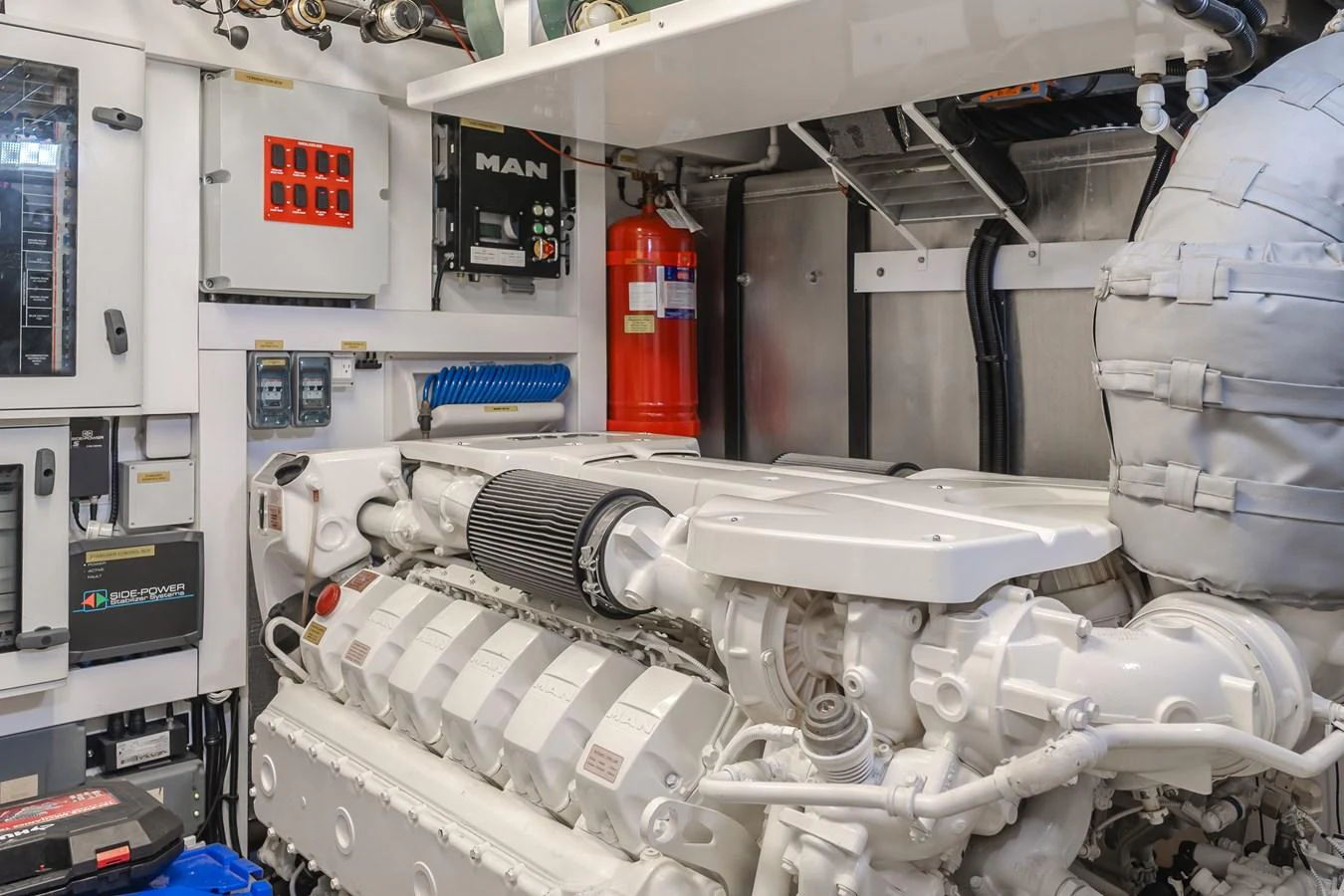 The image showcases the yacht's well-maintained engine room with advanced machinery. aboard AGUA RANCHO Yacht for Sale