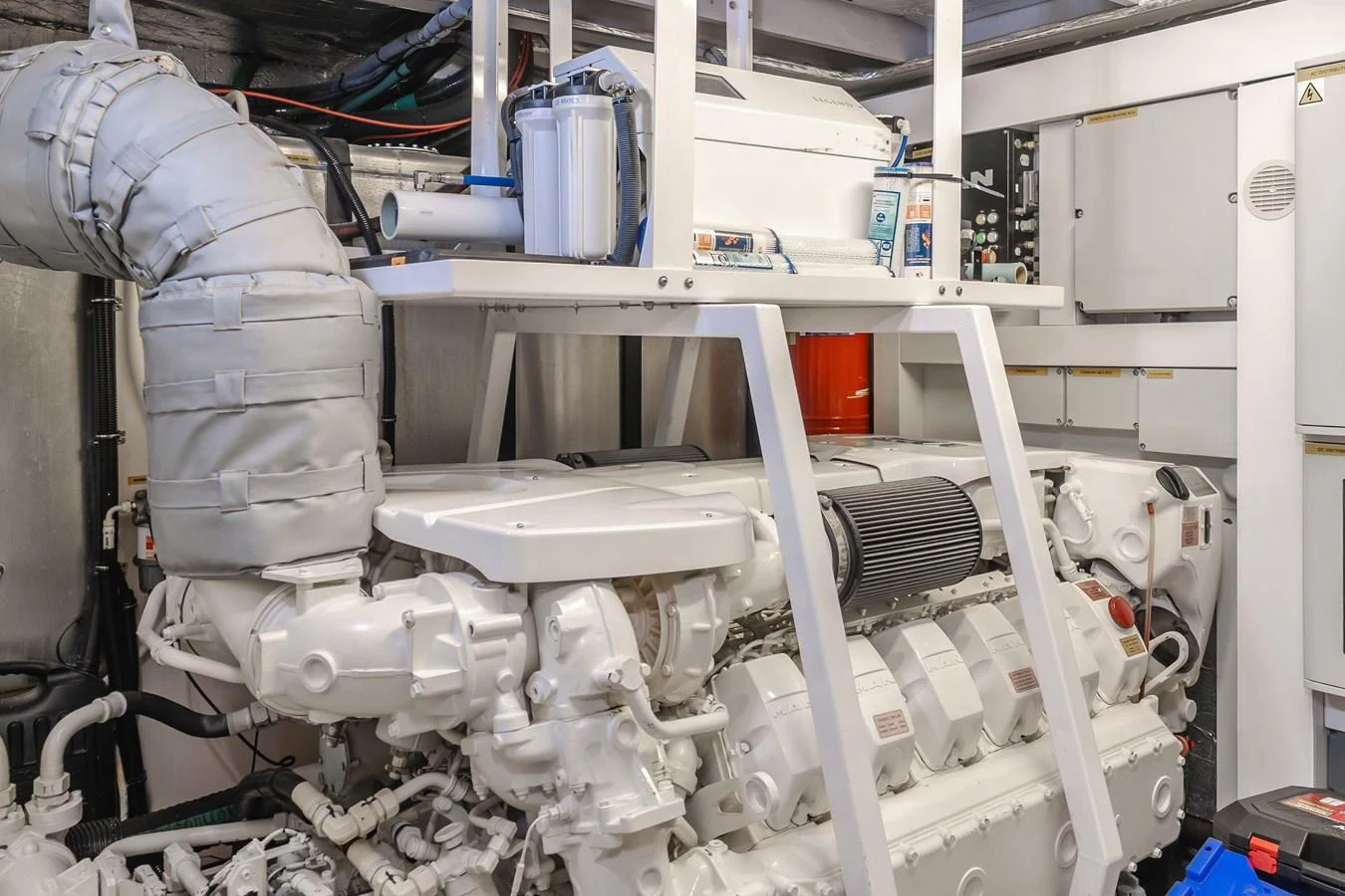 The image showcases the yacht's well-maintained engine room with advanced machinery. aboard AGUA RANCHO Yacht for Sale
