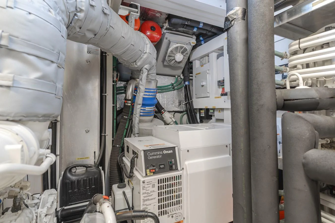 The image showcases the yacht's well-maintained engine room with essential machinery and equipment. aboard AGUA RANCHO Yacht for Sale