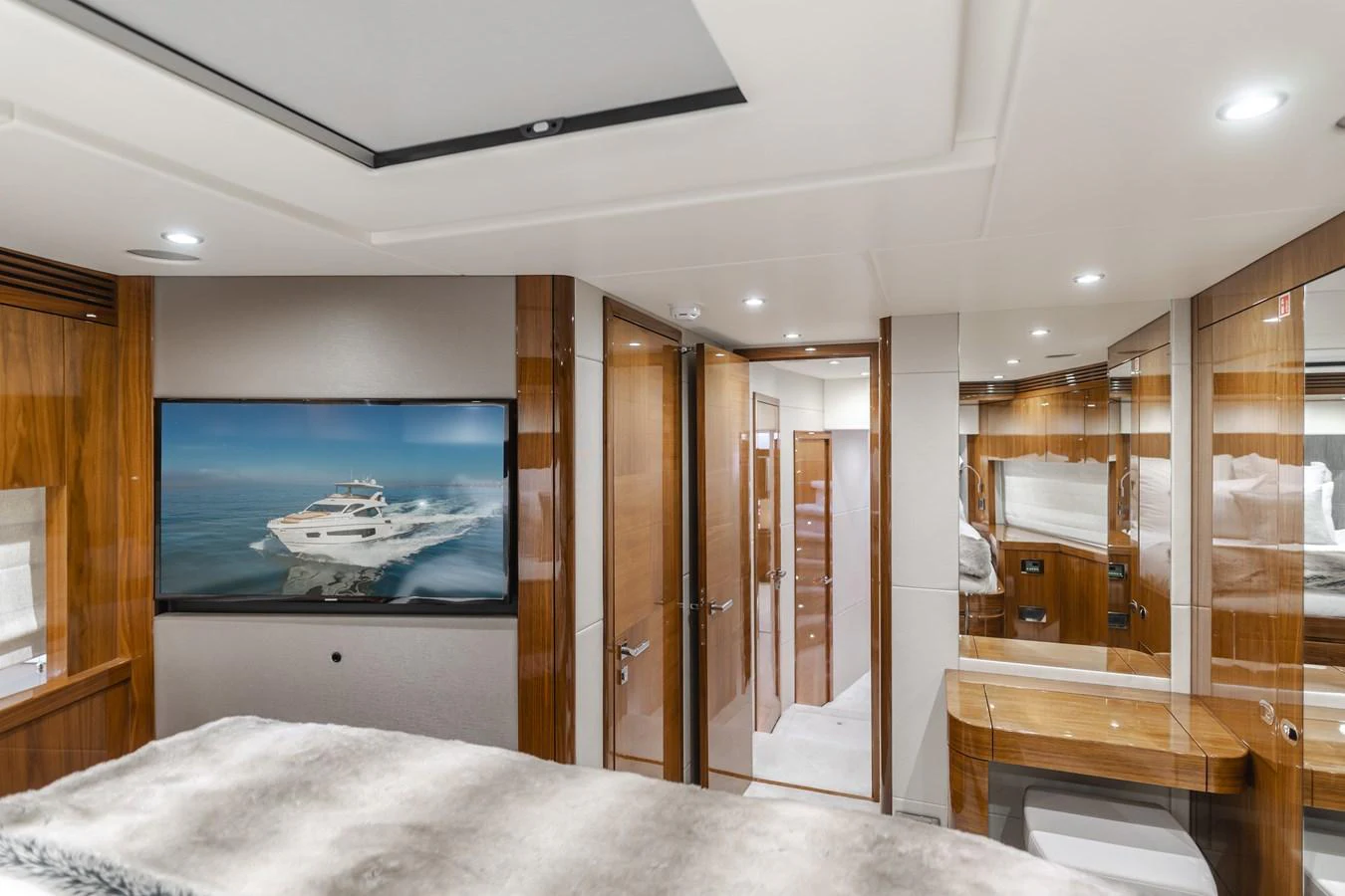 The stateroom features luxurious wood finishes and modern amenities, creating a serene and elegant atmosphere. aboard AGUA RANCHO Yacht for Sale