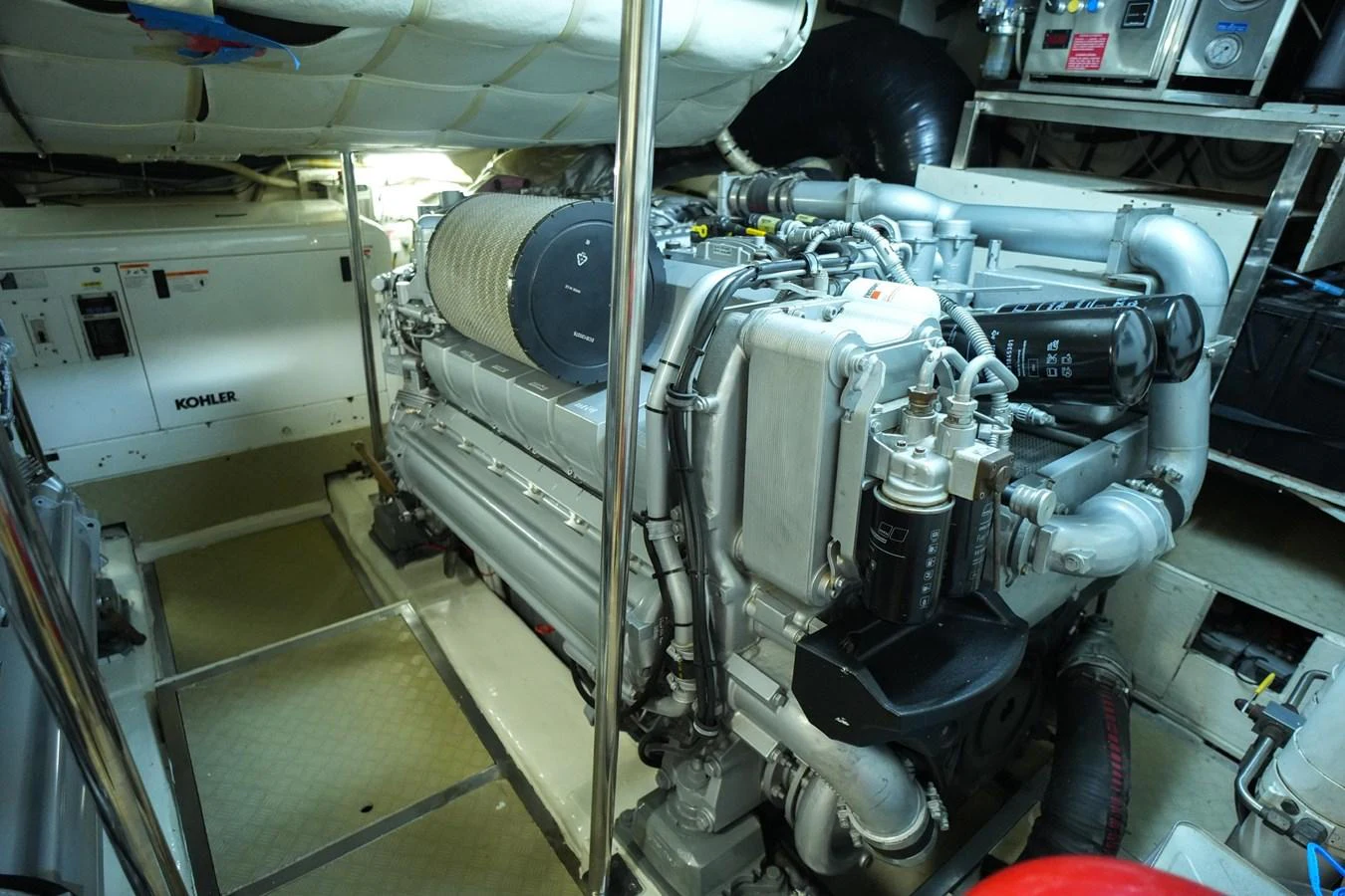 The image showcases the well-maintained engine room of the yacht, highlighting its powerful machinery. aboard FREEDOM 2 Yacht for Sale
