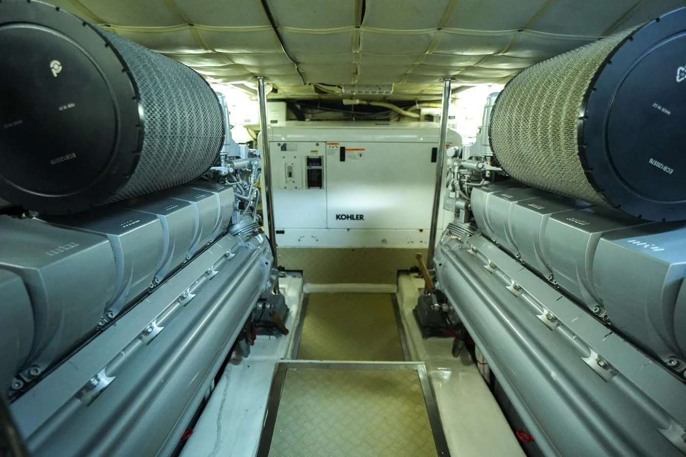 The engine room showcases powerful machinery and a well-organized layout. aboard FREEDOM 2 Yacht for Sale