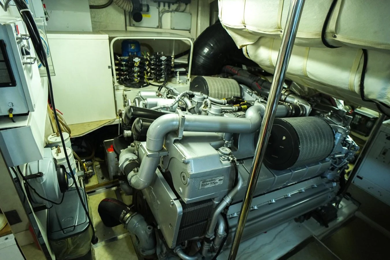 The image showcases the yacht's well-maintained engine room with powerful machinery. aboard FREEDOM 2 Yacht for Sale
